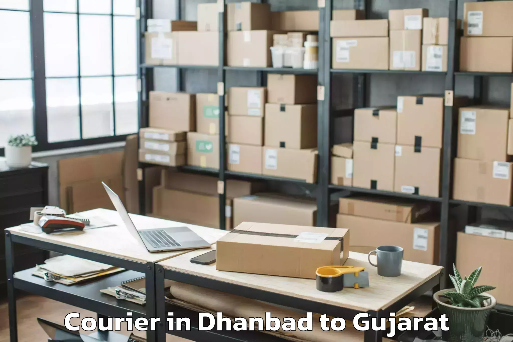 Reliable Dhanbad to Abrama Courier